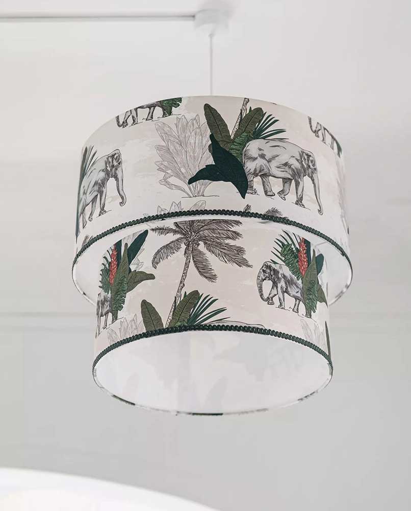 Photo of hanging lampshade with british colonial elephant pattern wrapped around it
